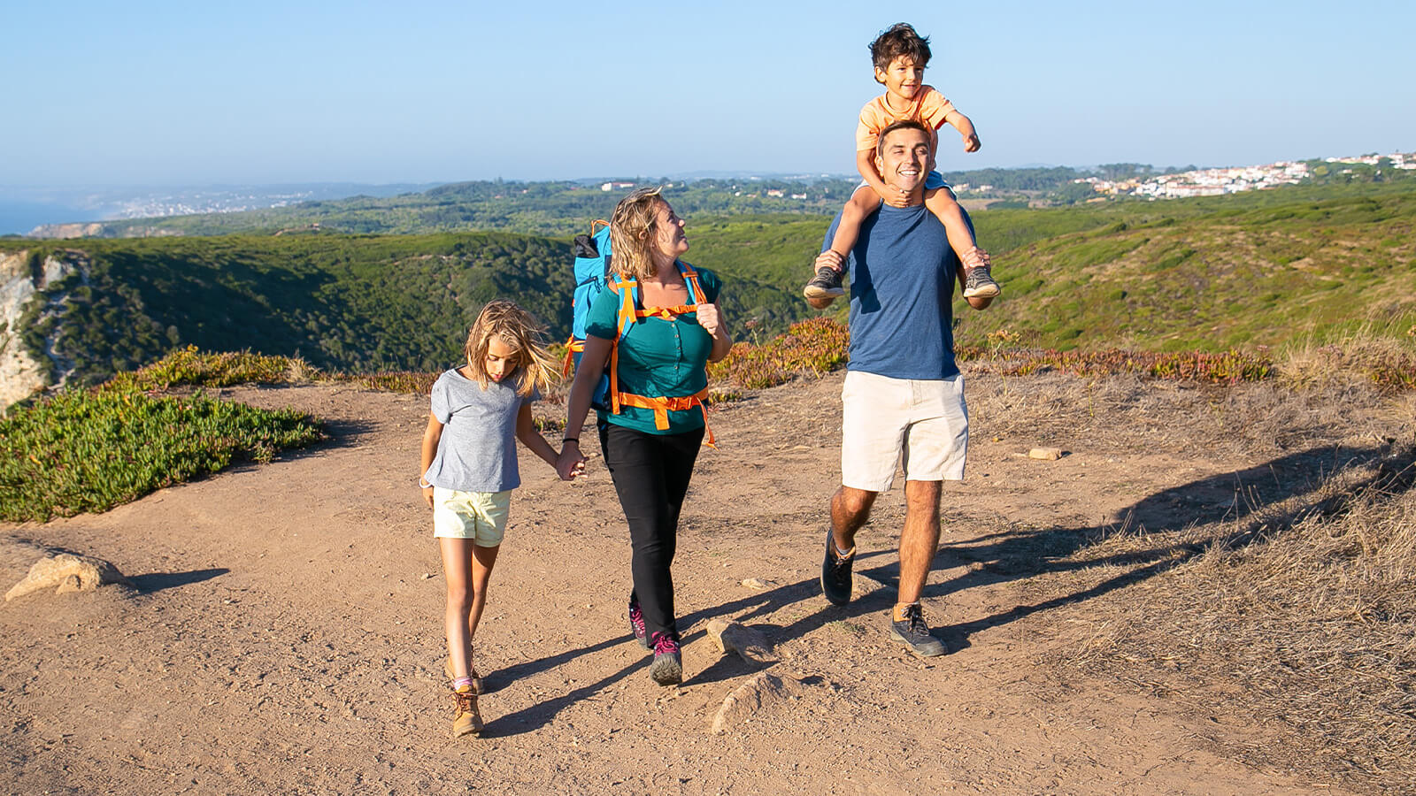 Family hiking on foot